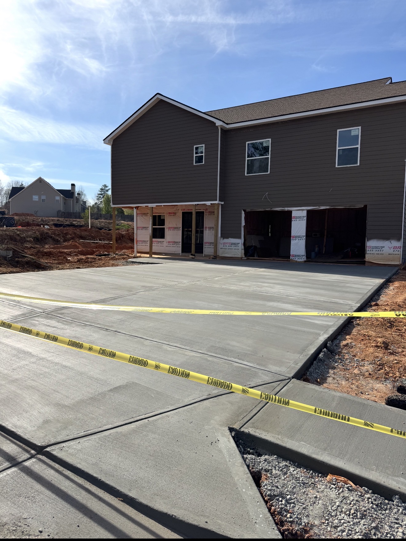 Poured concrete driveway on new residential home